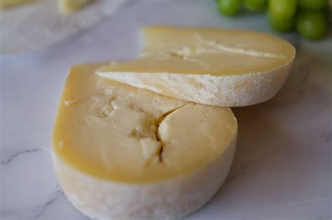  Queso de Mahón!  An Aged Spanish Cheese Offering Creamy Textures and Robust Nutty Flavors